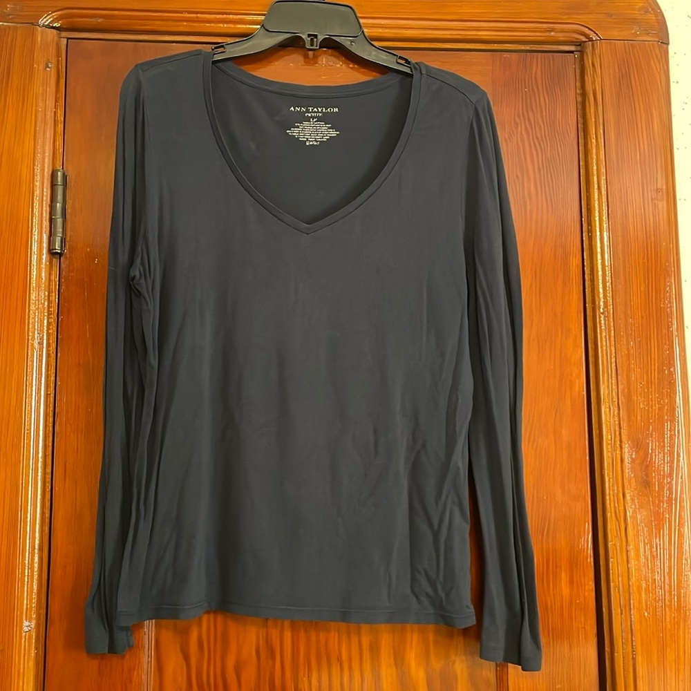 Navy blue long sleeve T shirt.